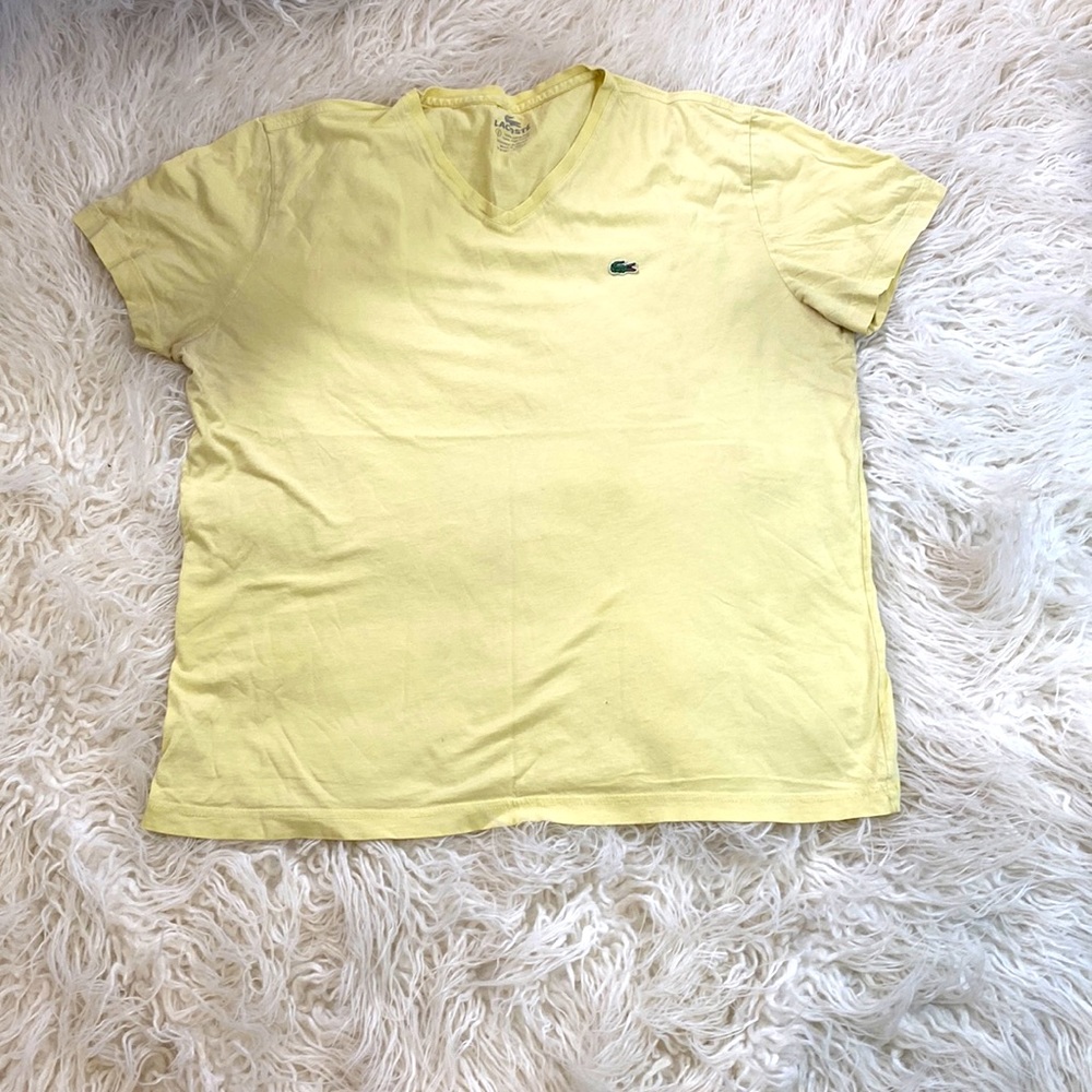 Bright yellow Lacoste tee